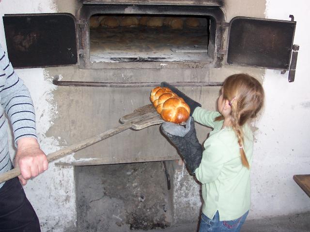 Helping in the oven house